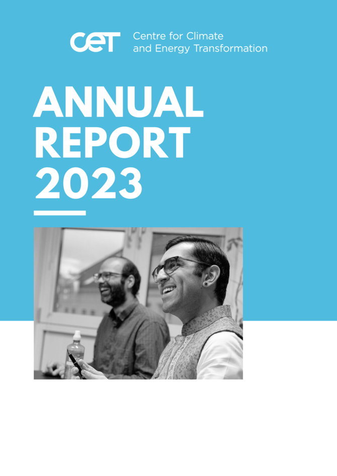 Front page of Annual Report 2023 with image of two people smiling