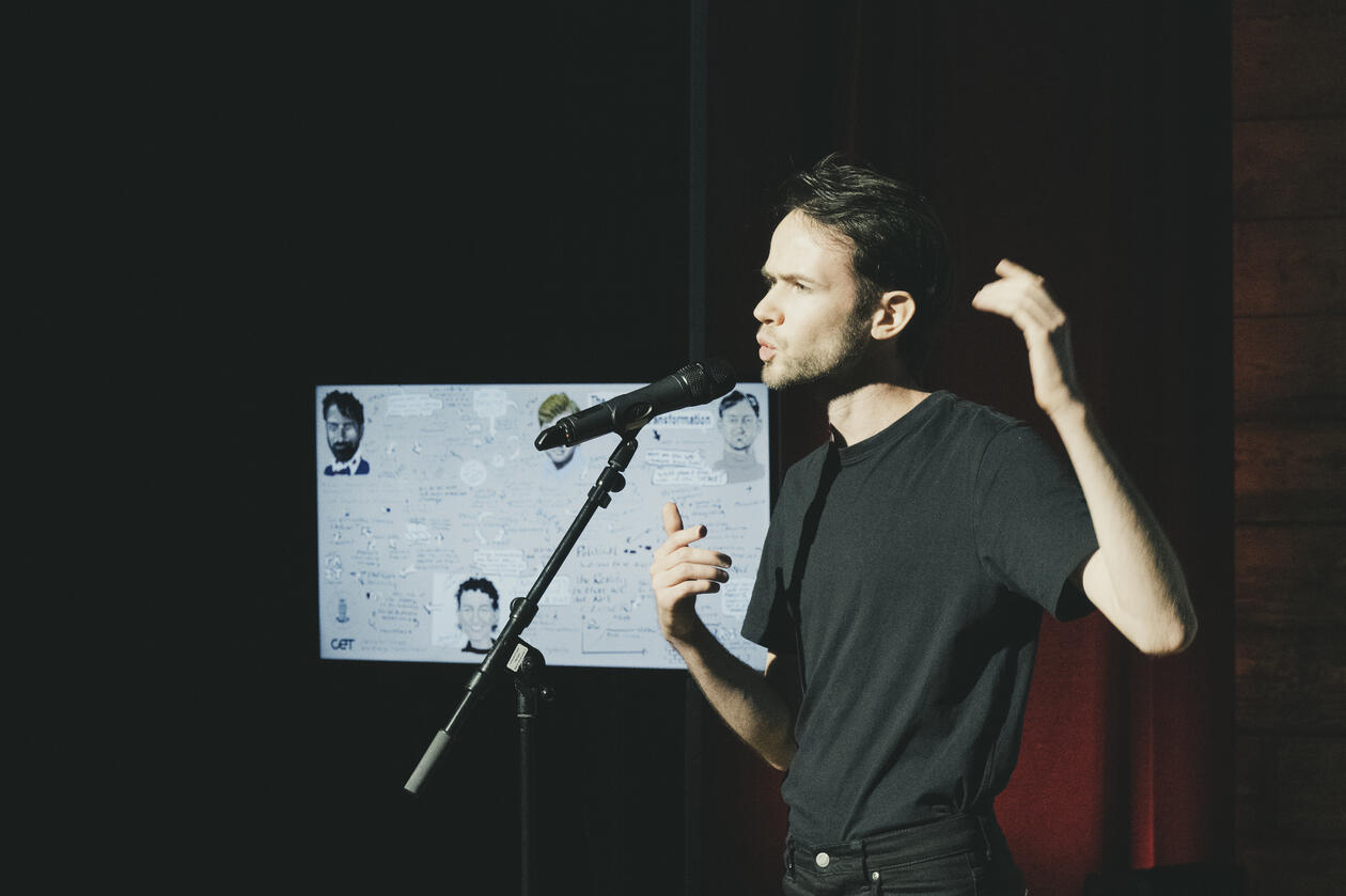 image of white male performing poetry