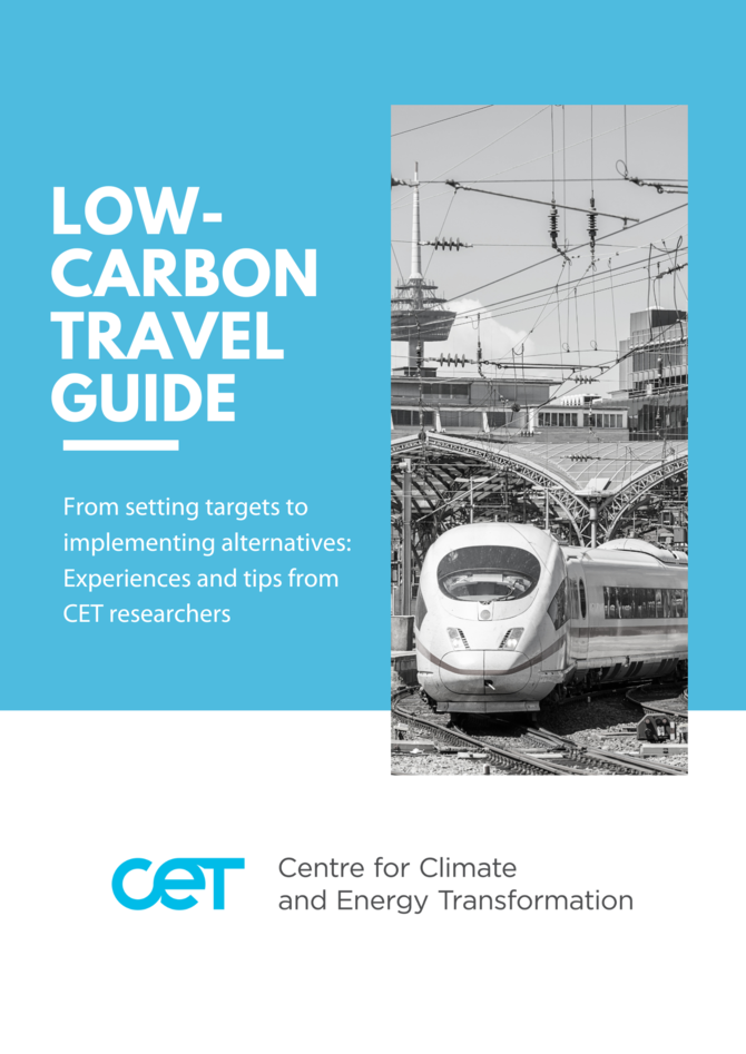 Front page of Low-carbon travel guide with image of a train in black and white