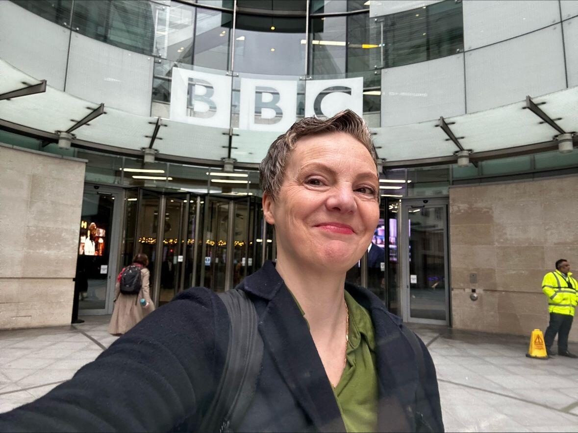 Jill Walker Rettberg smiling in front of the BBC offices.