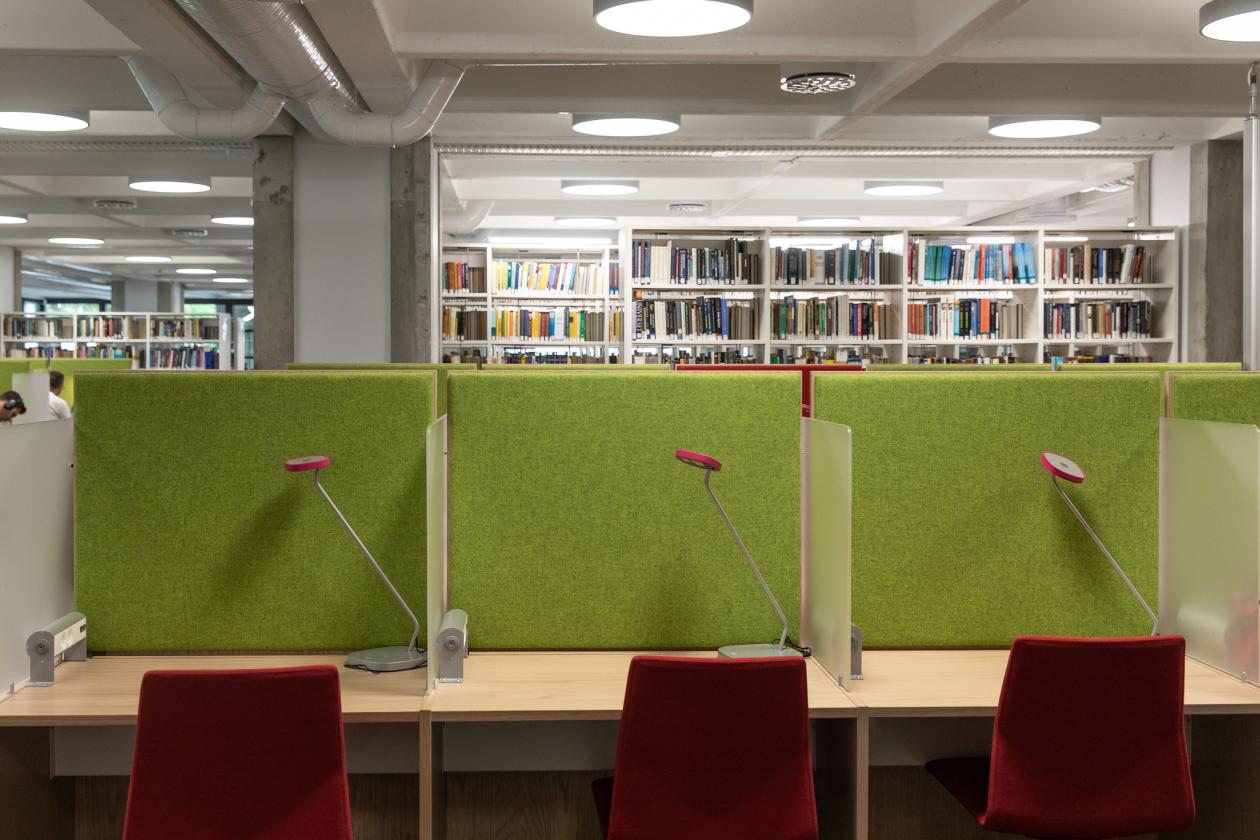 Empty desks with green felt