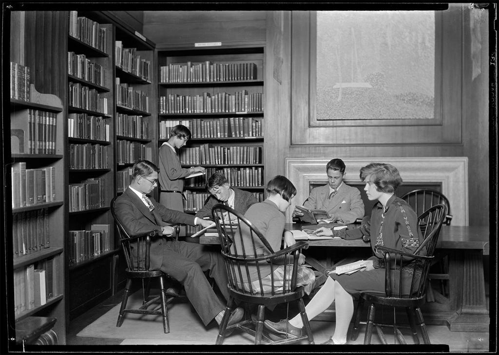 Black and white photo of students studying together at a table