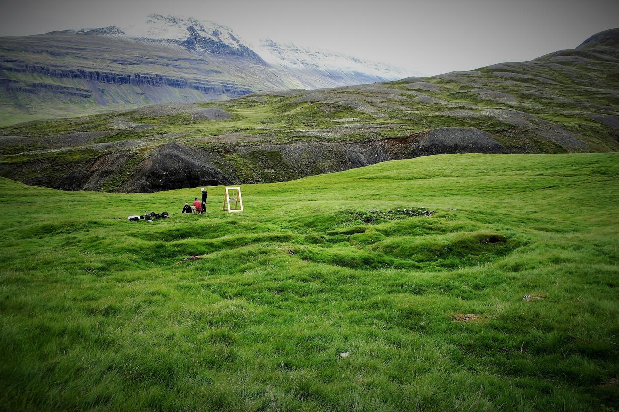 Landscape: animals and archeologists in the mountains.