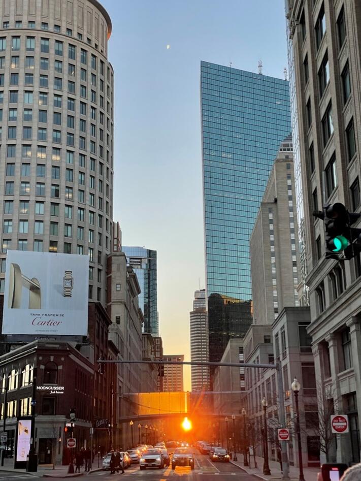 Sunset through the skyscrapers.