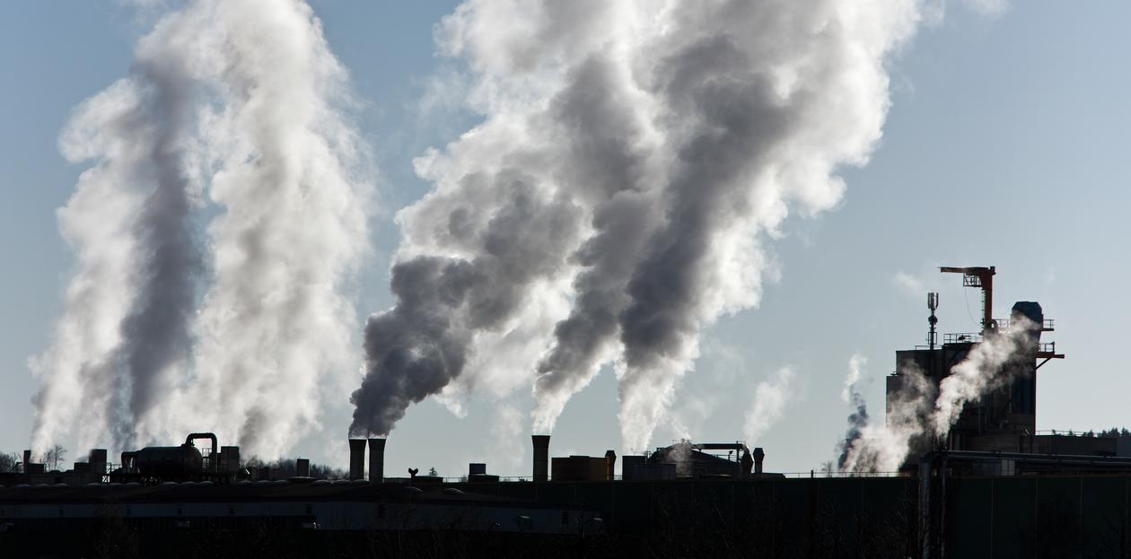 CO2 emissions illustration photo of smoking industrial output