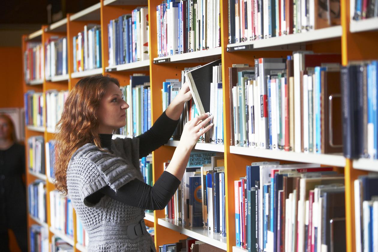 Young woman in library