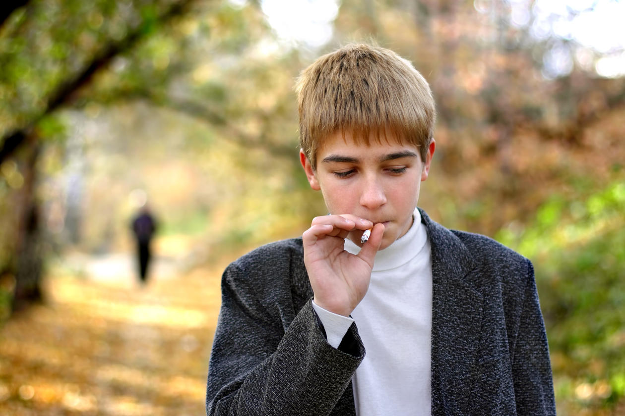 smoking adolescent boy