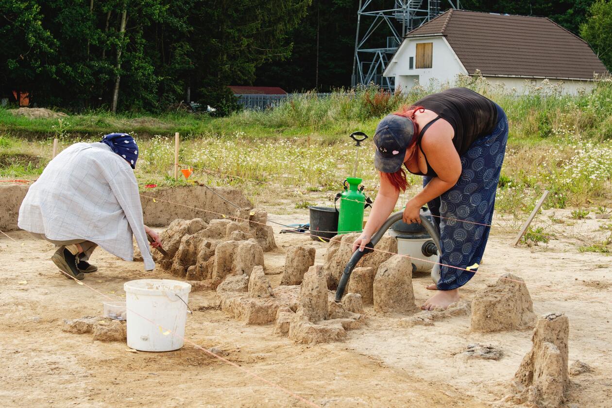 Two women working on an archaeological site.
