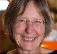 Smiling lady with glasses