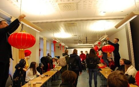 students decorating for the chinese new year celebration