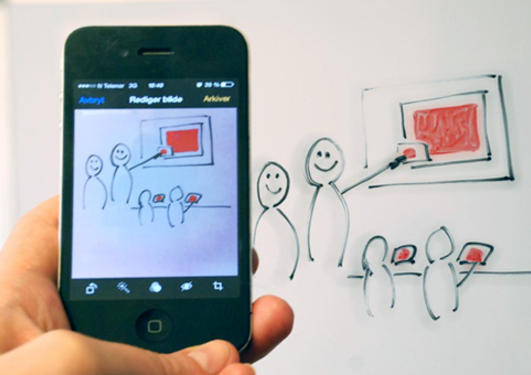 Illustrasjon av mobilkamera som tar bilde av undervisning