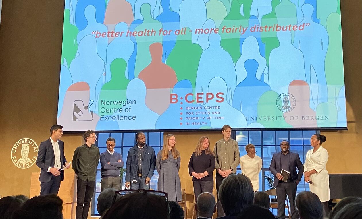 BCEPS PhD Students are standing on the stage at the opening event of BCEPS