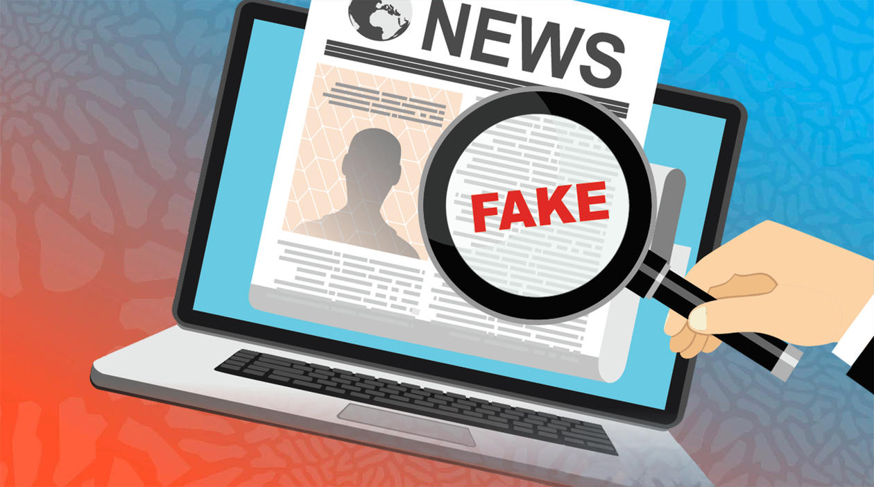Illustration of a pc screen with a newspaper in it, and a magnifying glass with the text Fake News.