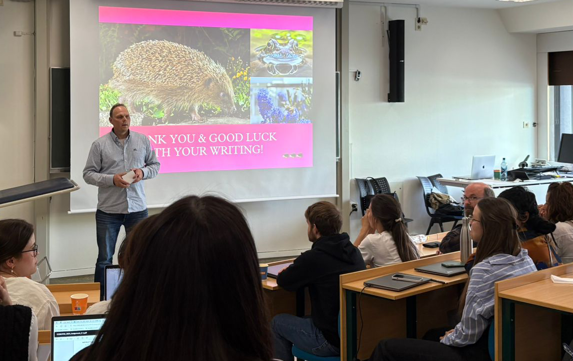 Teacher in front of the class.