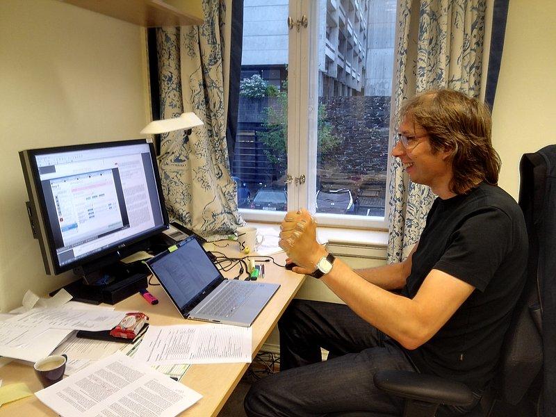 man sitting at workplace