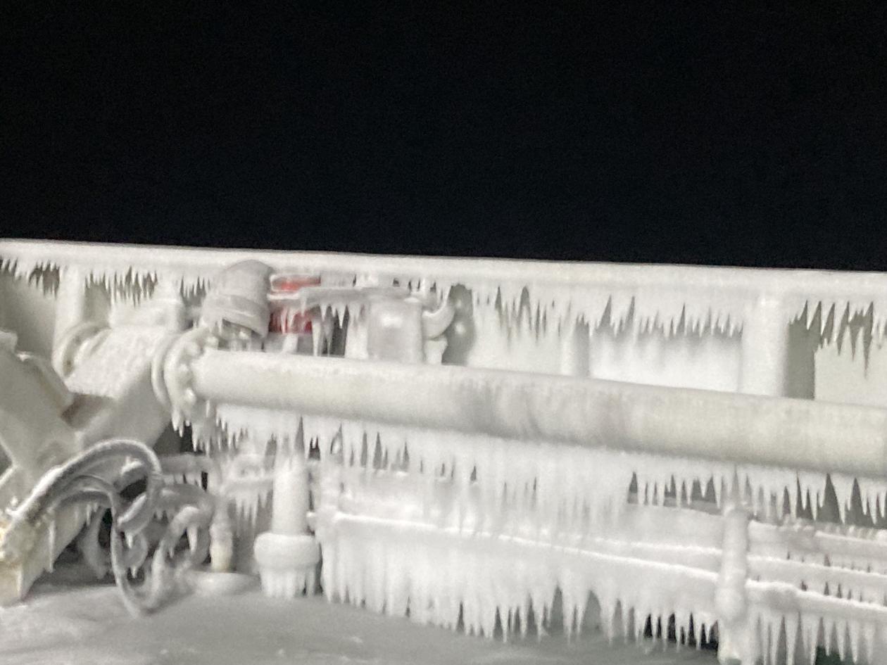 Front of the Kronprins Haakon ship covered in ice