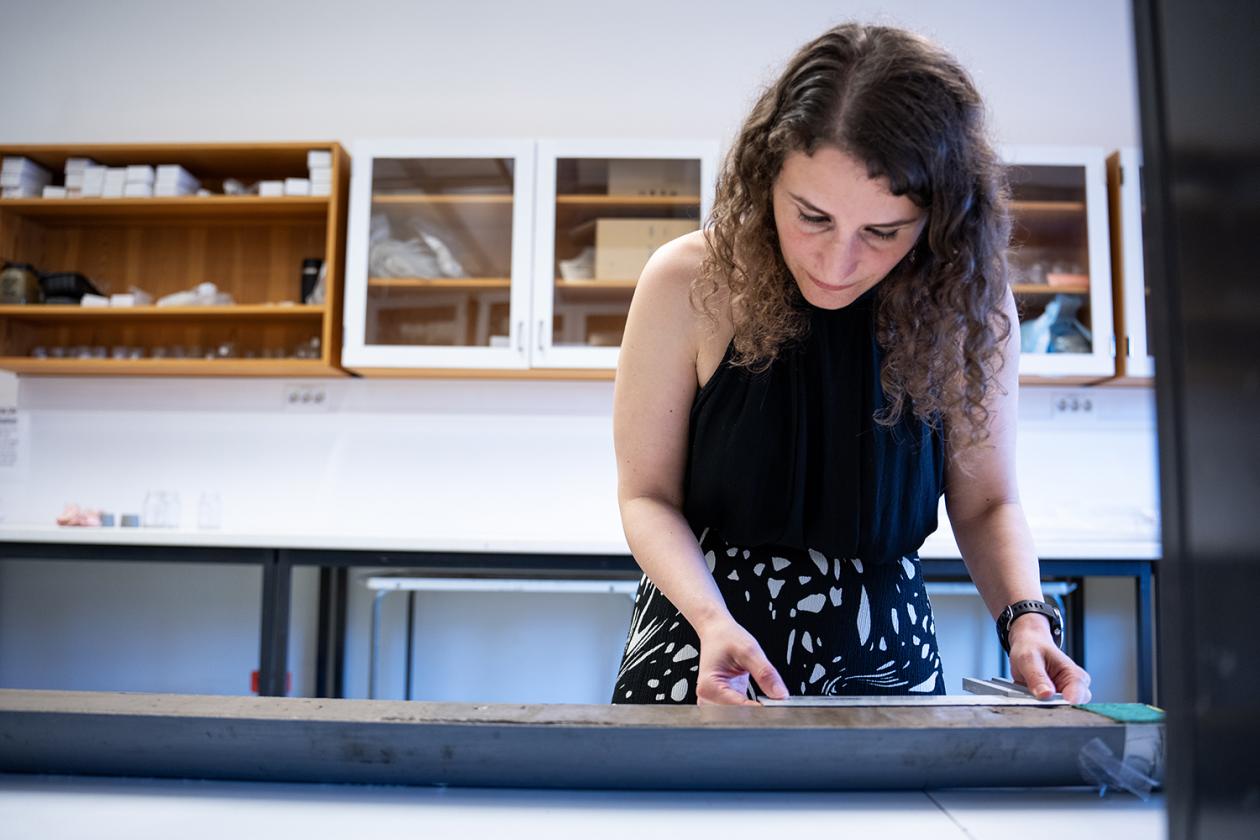 Nil Irvali examining sediment cores taken from the sea floor in the North Atlantic Ocean