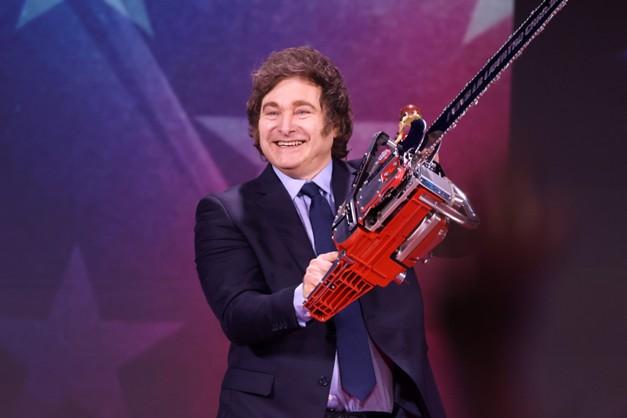 President Javier Milei of Argentina with a chainsaw