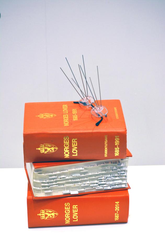 Stabel med lovbøker