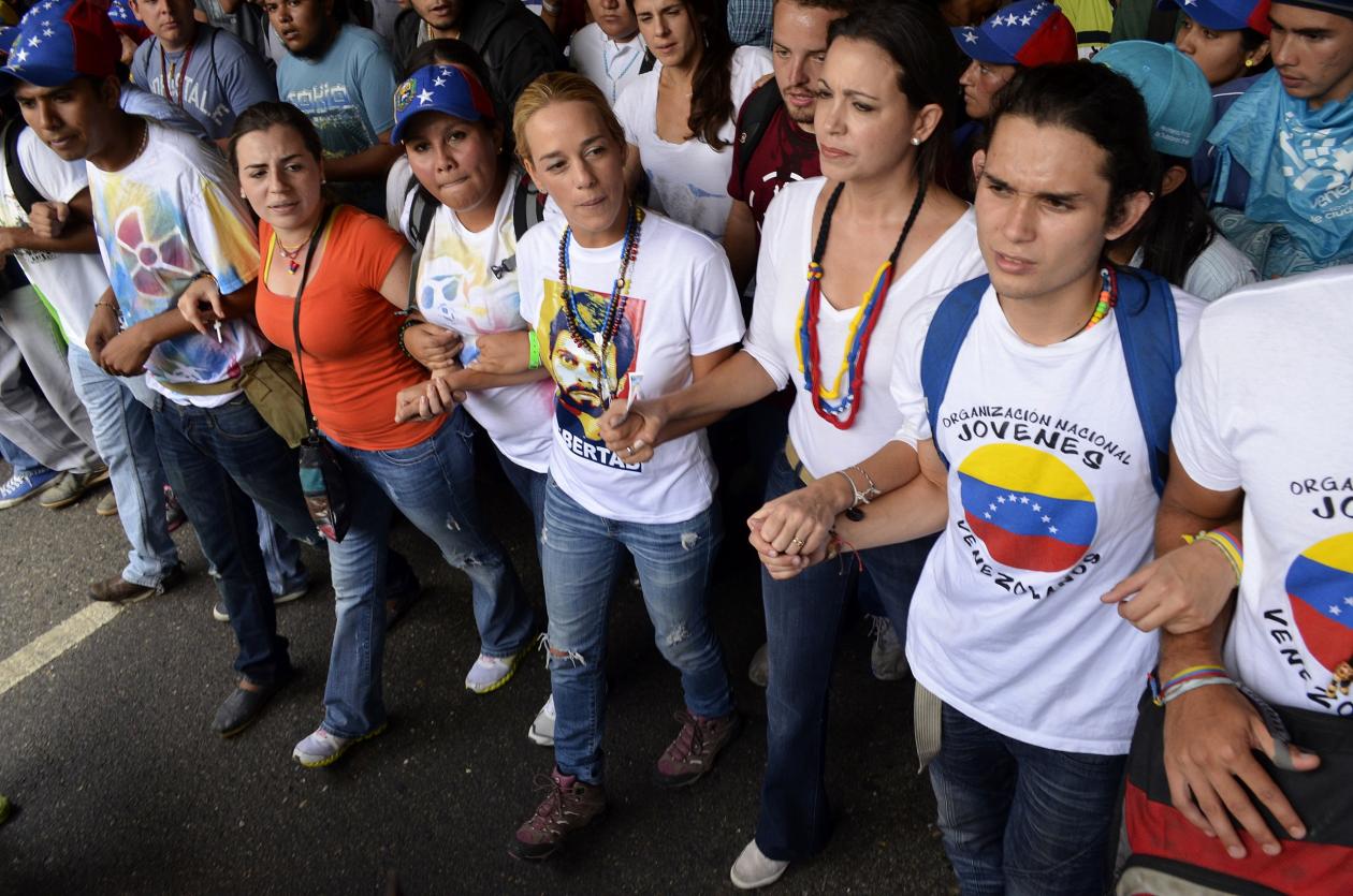 Maria Corina Machado marching with crowd