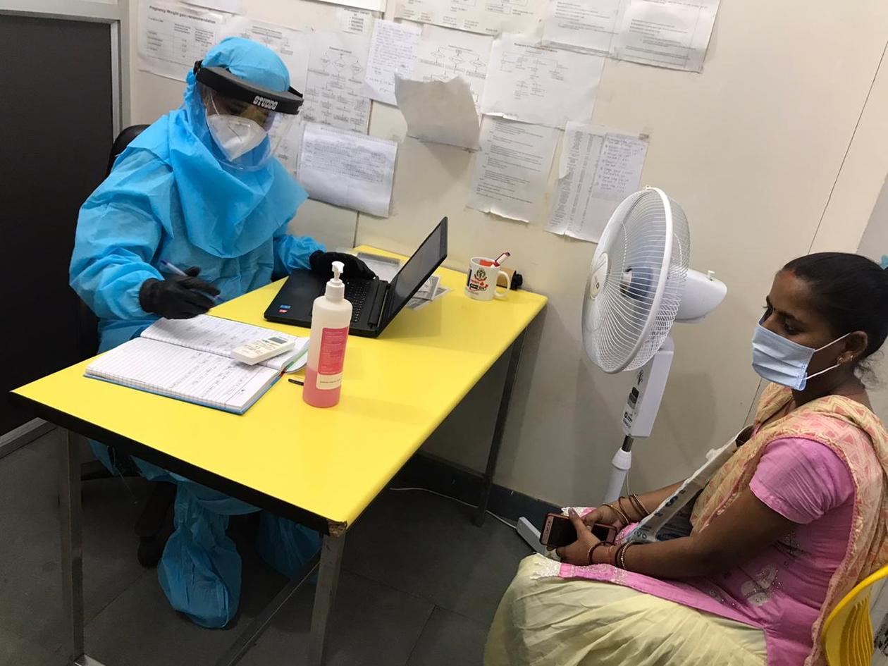 Physician in PPE at outreach clinic