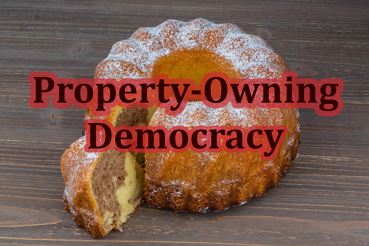 A marble cake and with one slice cut of and the text "Property-Owning Democracy"