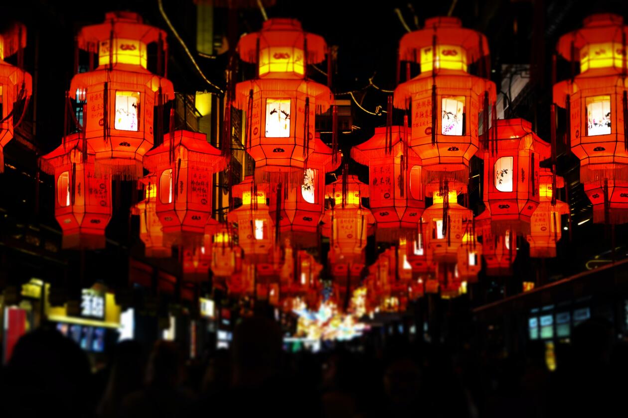 The Lantern Festival at the Yu’yuan Gardens in Shanghai, China. Each lantern has a riddle on it.