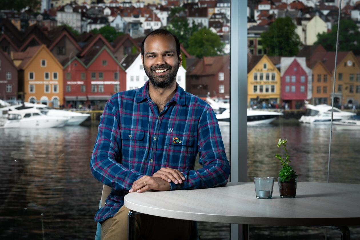 Portrait of Siddharth Sareen in front of Bryggen in Bergen