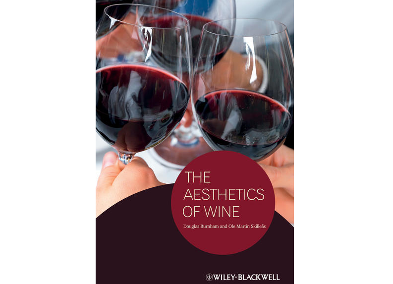 Bokomslag - tre fylte rødvinsglass i en skål