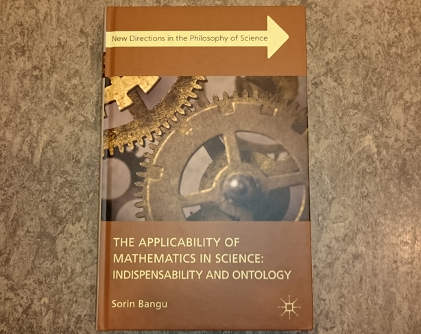 Bokomslag med utsnitt av to tannhjul som går i hverandre