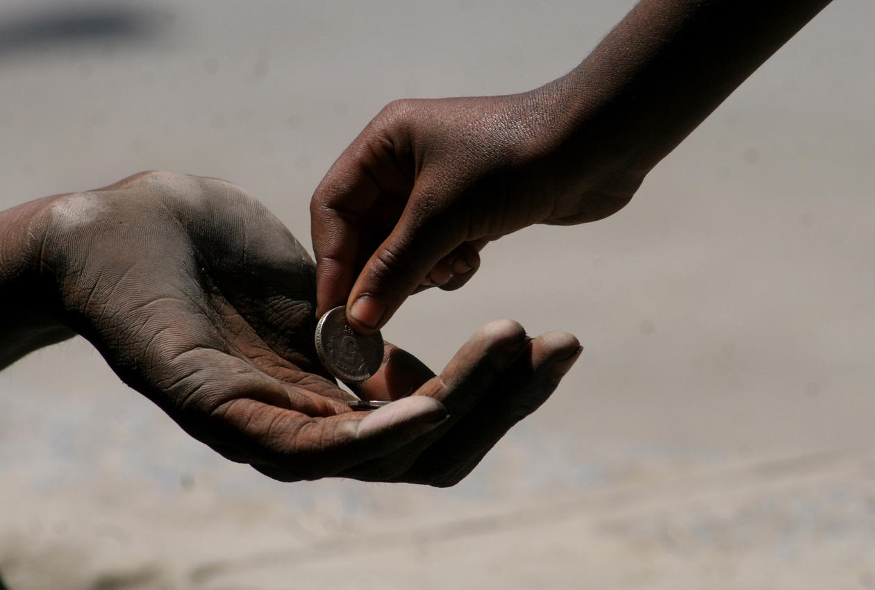 Tigging, To hender med mynt