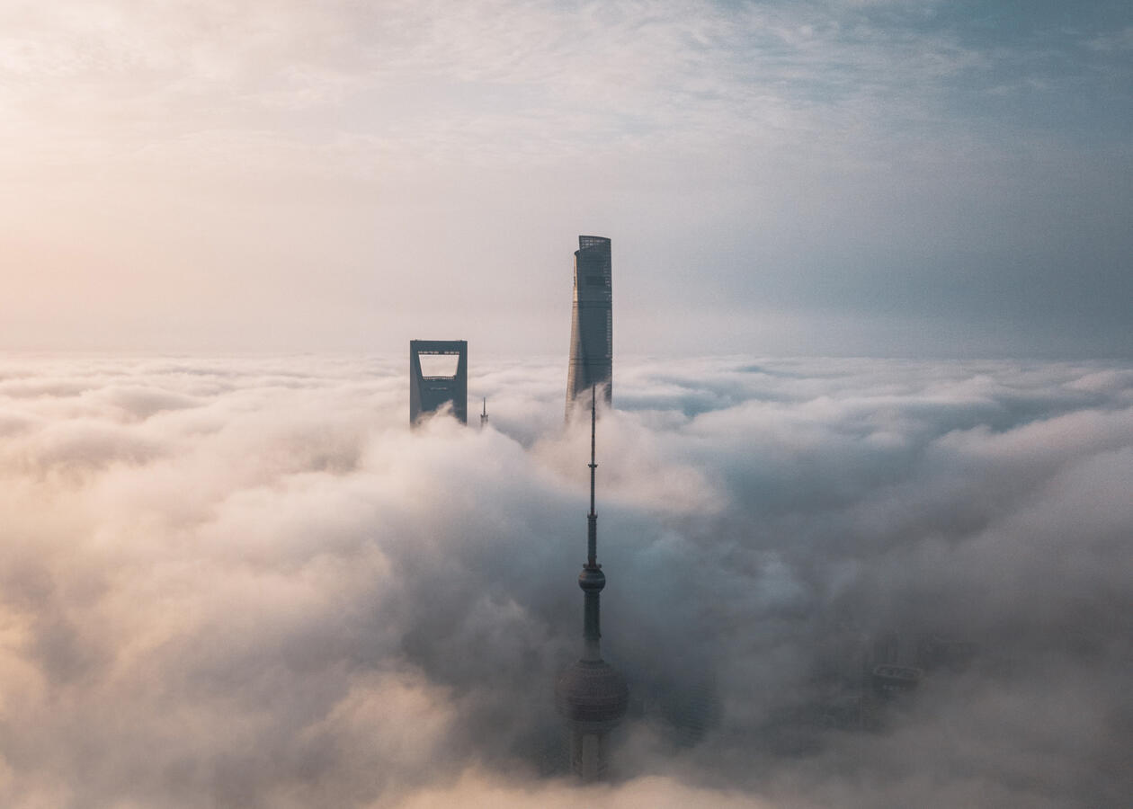 Shanghai towers above the mist