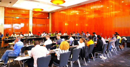 A group of people attending a conference.