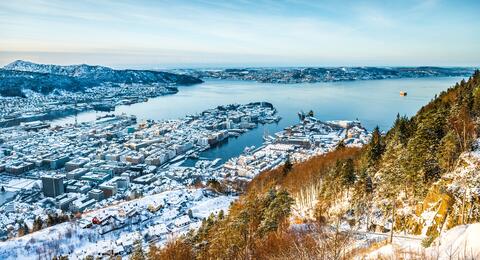 Long distance view of Bergen with snow. 