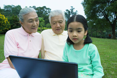 Chinese grandparents with their granddaughter, illustration photo about China's one-child policy.