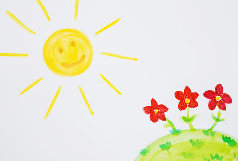 Children's drawing of the sun overshining a field with three red flowers