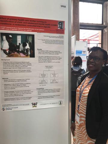 PhD candidate presenting her poster