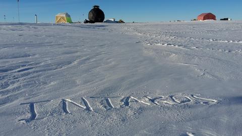Intaros written on top of snow
