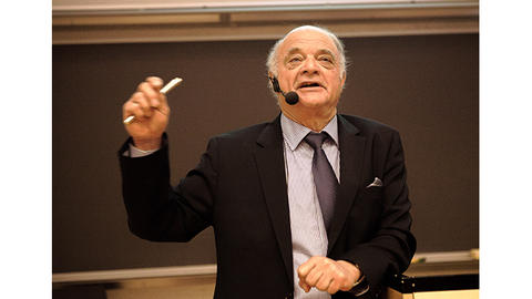 Professor Kerbel holding a lecture in an auditorium