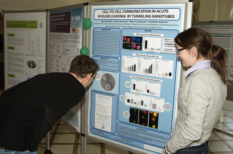 Maria Omsland is showing her poster at the CCBIO symposium 2014