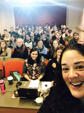 Photo of Mia Zamora with her students in DIKULT103, January 2018.
