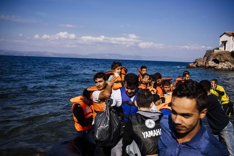 In October 2015, image of migrants on a boat are landing on the Greek island of Lesbos.