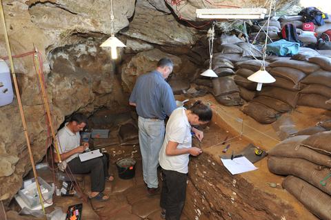 Researchers and from the TRACSYMBOLS project working in Blombos Cave, South Africa.