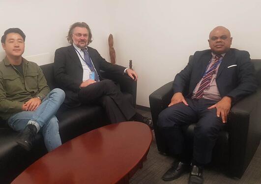 Professor Edvard Hviding (centre) from the University of Bergen with Vanuatu’s UN Ambassador Odo Tevi (right) and Solomon Yeo (left) from the activist organisation Pacific Islands Students Fighting Climate Change.