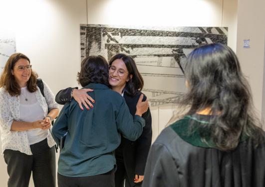 Inés Fournon Berodia huhgs members of the jury after her PhD defense.