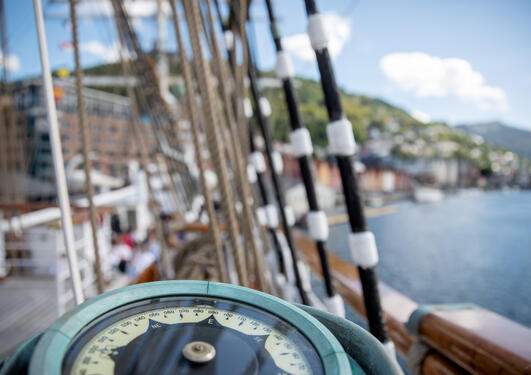 Photo of compass on board tall ship Statsraad Lehmkuhl at the official launch of the One Ocean Expedition.