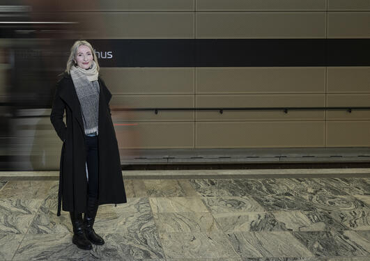 Portrait of Agnete Engelsen standing in the underground station of Haukeland University Hospital.