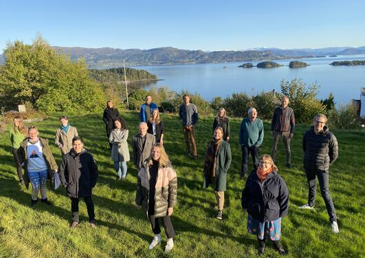 Group of people in front of fjord