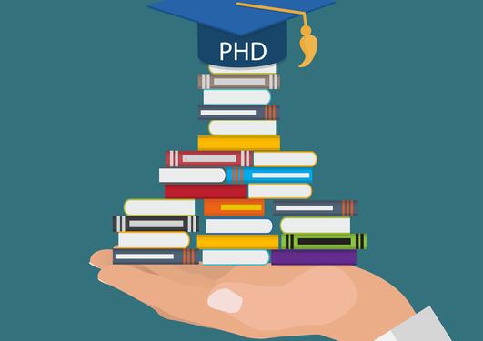 illustration photo showing books and a graduation cap