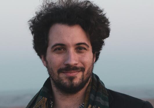 portrettbilde William Denault